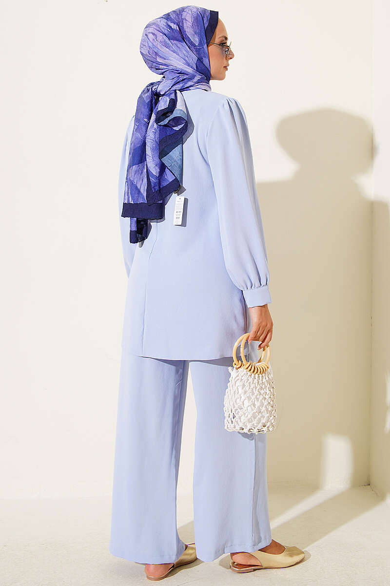 https://cdn.pazarium.com.tr/kus-gozu-detayli-bagcikli-ikili-takim-mavi-804748-19-B.jpg