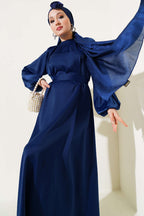 https://cdn.pazarium.com.tr/kusakli-balon-kol-saten-abiye-elbise-lacivert-756071-15-B.jpg