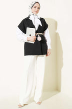 https://cdn.pazarium.com.tr/kusakli-blazer-yelek-siyah-762615-18-B.jpg