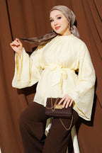 https://cdn.pazarium.com.tr/kusakli-sifon-yarasa-kol-tunik-sari-812153-20-B.jpg