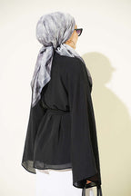 https://cdn.pazarium.com.tr/kusakli-sifon-yarasa-kol-tunik-siyah-812293-20-B.jpg