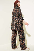 https://cdn.pazarium.com.tr/leopar-desenli-burumcuk-kimono-ikili-takim-leopar-613838-14-B.jpg