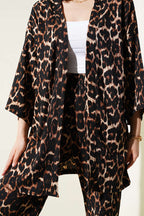 https://cdn.pazarium.com.tr/leopar-desenli-burumcuk-kimono-ikili-takim-leopar-613841-14-B.jpg