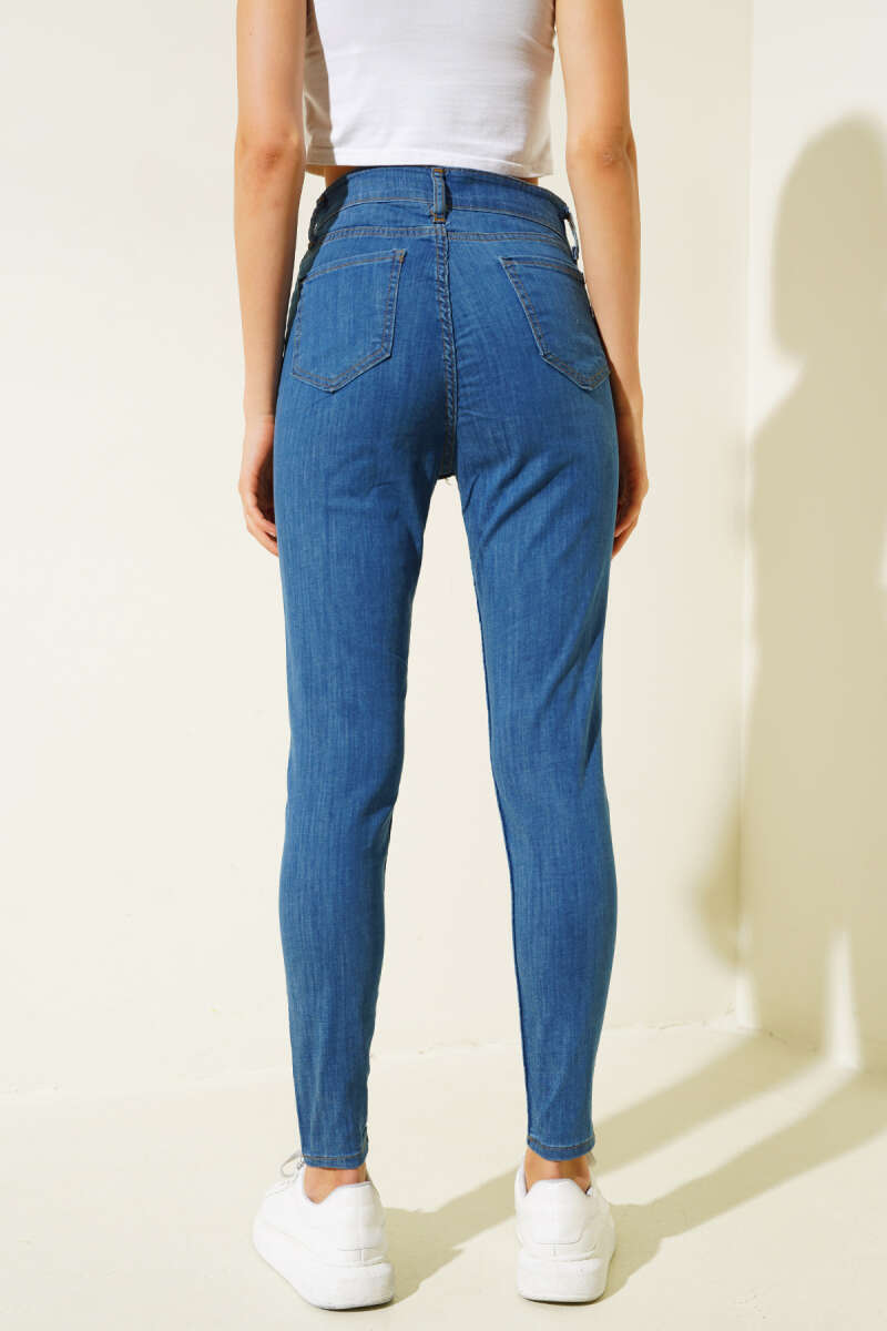 https://cdn.pazarium.com.tr/likrali-skinny-jean-pantolon-orta-mavi-545651-13-B.jpg