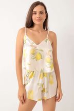 https://cdn.pazarium.com.tr/limon-desen-askili-saten-pijama-takimi-beyaz-538367-12-B.jpg