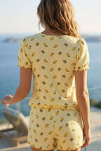 https://cdn.pazarium.com.tr/limon-desen-kisa-kollu-sortlu-pijama-takim-sari-807592-19-B.jpg