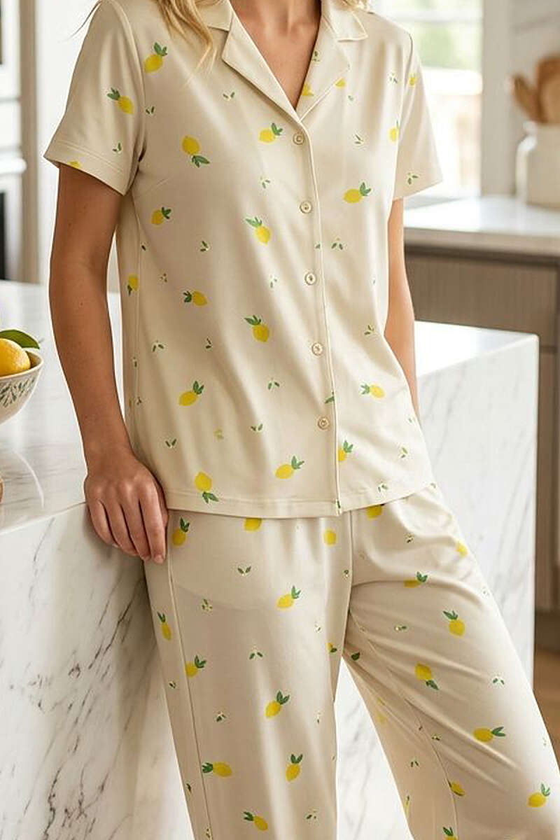 https://cdn.pazarium.com.tr/limon-desenli-kisa-kol-dugmeli-pijama-takim-sari-787667-19-B.jpg
