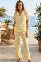 https://cdn.pazarium.com.tr/limon-desenli-muslin-kisa-kollu-pijama-takimi-sari-802190-19-B.jpg