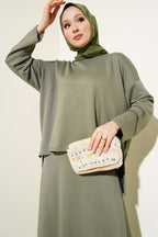 https://cdn.pazarium.com.tr/loysa-basic-tunik-etek-ikili-takim-cagla-yesili-621654-14-B.jpg