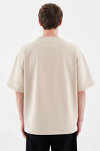 https://cdn.pazarium.com.tr/machinist-nakisli-oversize-erkek-t-shirt-bej-731466-17-B.jpg