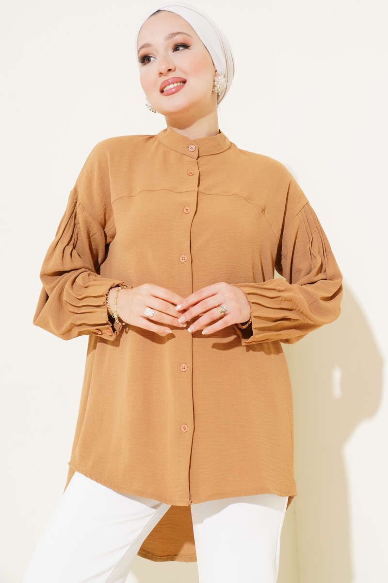 https://cdn.pazarium.com.tr/manset-buzgulu-tunik-camel-637150-11-B.jpg