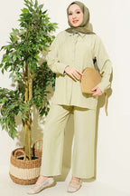https://cdn.pazarium.com.tr/manset-dugmeli-basic-ikili-takim-su-yesili-814349-20-B.jpg