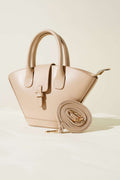 https://cdn.pazarium.com.tr/miknatisli-ucgen-el-cantasi-bej-597075-14-B.jpg