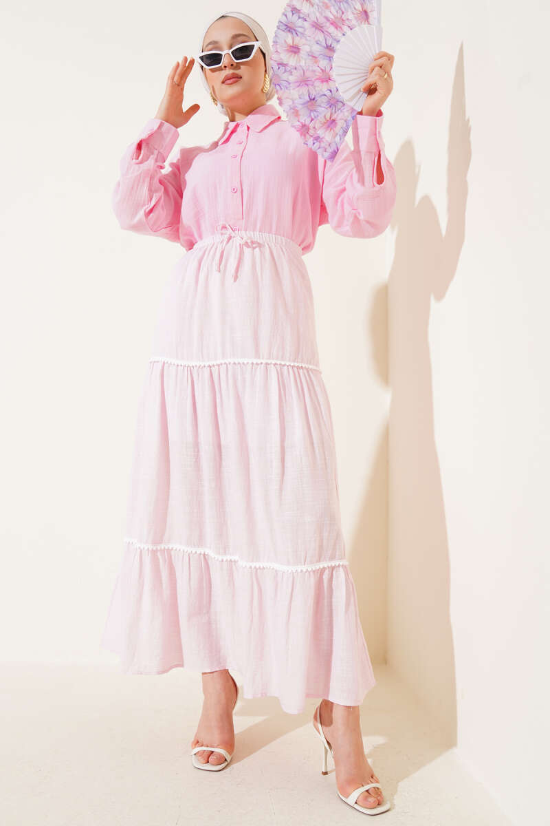 https://cdn.pazarium.com.tr/mini-pon-pon-detayli-etek-pembe-652419-15-B.jpg