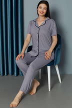https://cdn.pazarium.com.tr/mini-puantiyeli-kisa-kol-pijama-takimi-lila-582648-13-B.jpg