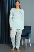 https://cdn.pazarium.com.tr/nakisli-desenli-viskon-buyuk-beden-pijama-takim-buz-mavisi-583320-13-B.jpg