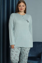 https://cdn.pazarium.com.tr/nakisli-desenli-viskon-buyuk-beden-pijama-takim-mint-583313-13-B.jpg