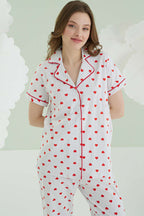 https://cdn.pazarium.com.tr/nbb-kalp-desenli-dugmeli-keten-pijama-takimi-ekru-614654-14-B.jpg