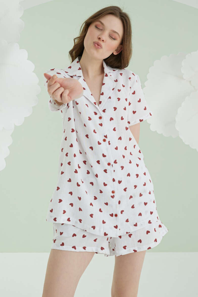 https://cdn.pazarium.com.tr/nbb-kalpli-dugmeli-sort-keten-pijama-takim-ekru-620487-14-B.jpg