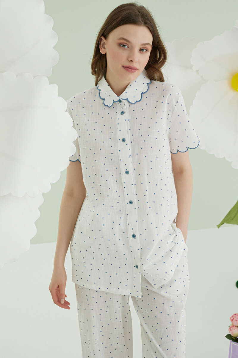 https://cdn.pazarium.com.tr/nbb-puantiyeli-keten-pijama-takimi-mavi-614649-14-B.jpg