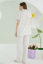 https://cdn.pazarium.com.tr/nbb-puantiyeli-keten-pijama-takimi-mavi-614650-14-B.jpg