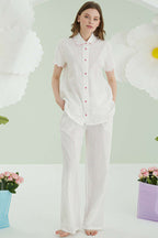 https://cdn.pazarium.com.tr/nbb-puantiyeli-keten-pijama-takimi-pembe-614648-14-B.jpg
