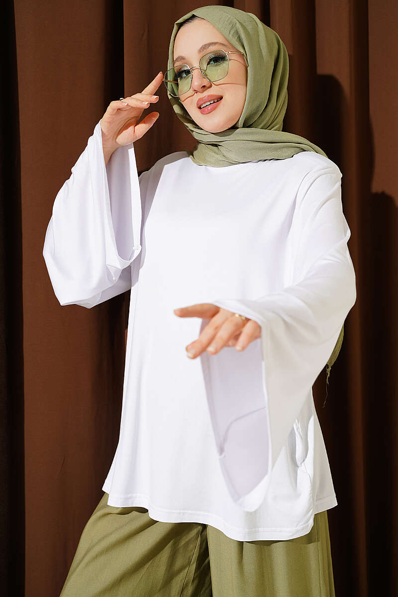 https://cdn.pazarium.com.tr/omuz-vatkali-genis-kollu-tunik-beyaz-801783-19-B.jpg