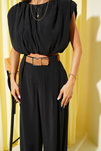 https://cdn.pazarium.com.tr/omuz-vatkali-kolsuz-modal-ikili-takim-siyah-795977-19-B.jpg