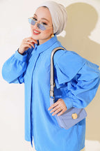 https://cdn.pazarium.com.tr/omuzlari-kat-kat-tunik-mavi-488202-11-B.jpg