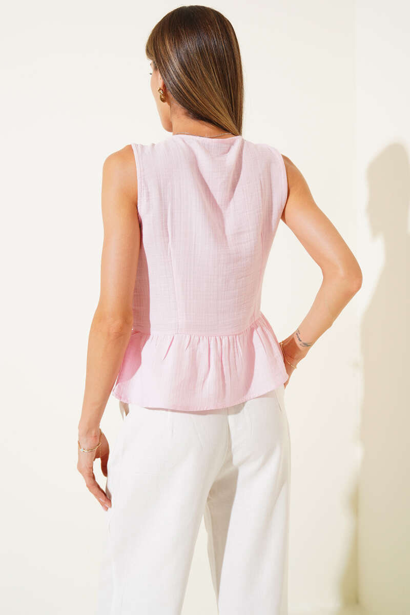 https://cdn.pazarium.com.tr/on-baglamali-pileli-bluz-pembe-654595-15-B.jpg