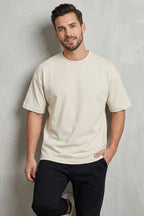 https://cdn.pazarium.com.tr/on-ve-arka-nakisli-oversize-erkek-t-shirt-kemik-756977-18-B.jpg
