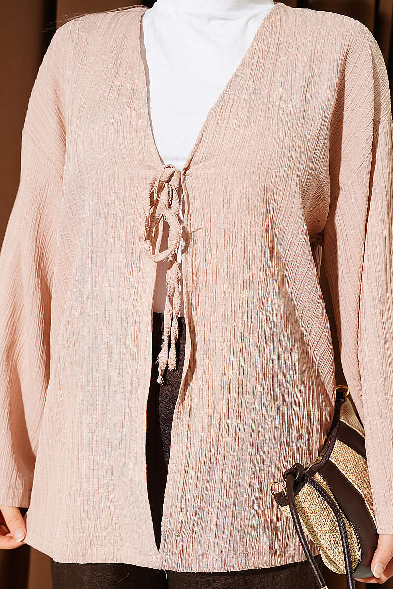 https://cdn.pazarium.com.tr/onu-bagcikli-agac-kabugu-kimono-bej-797687-19-B.jpg