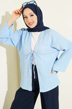 https://cdn.pazarium.com.tr/onu-bagcikli-agac-kabugu-kimono-mavi-797663-19-B.jpg