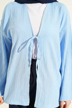 https://cdn.pazarium.com.tr/onu-bagcikli-agac-kabugu-kimono-mavi-797666-19-B.jpg