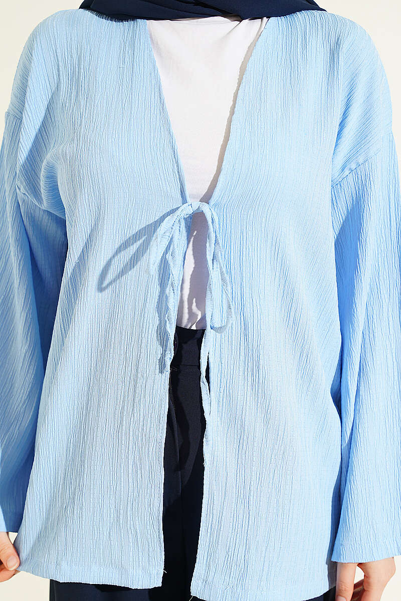 https://cdn.pazarium.com.tr/onu-bagcikli-agac-kabugu-kimono-mavi-797666-19-B.jpg