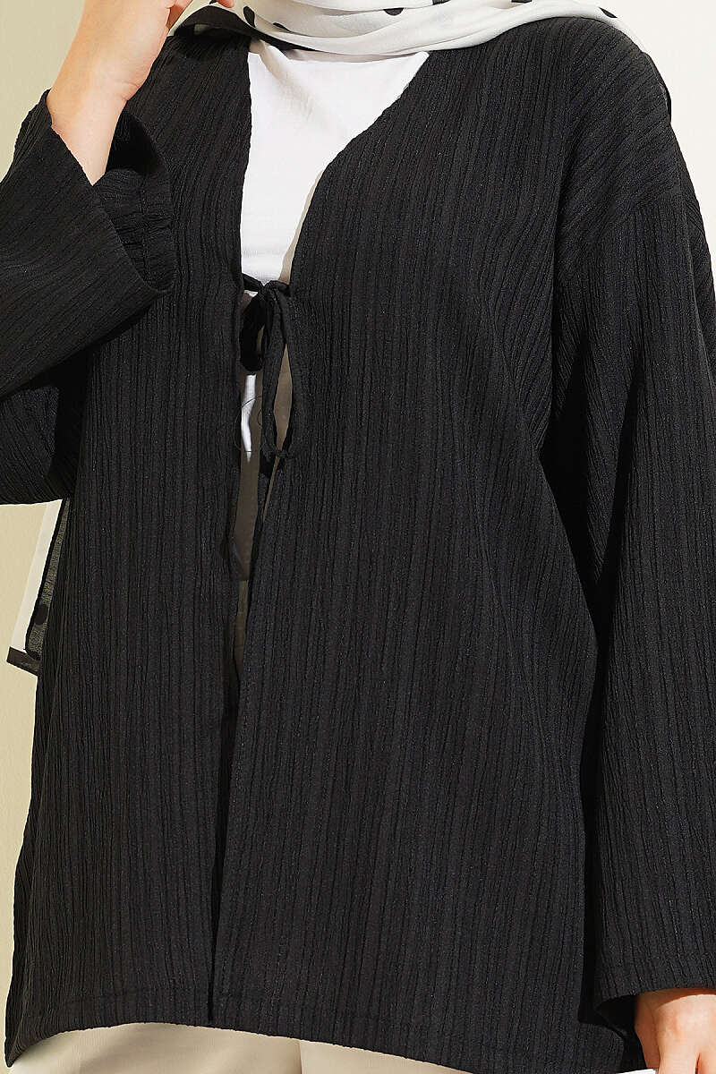https://cdn.pazarium.com.tr/onu-bagcikli-agac-kabugu-kimono-siyah-797618-19-B.jpg