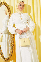 https://cdn.pazarium.com.tr/onu-bagcikli-gold-dugmeli-etekli-takim-ekru-794538-19-B.jpg