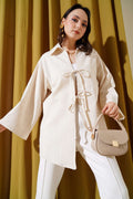 https://cdn.pazarium.com.tr/onu-bagcikli-keten-kimono-bej-618593-14-B.jpg