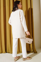 https://cdn.pazarium.com.tr/onu-bagcikli-keten-kimono-bej-618594-14-B.jpg