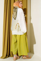 https://cdn.pazarium.com.tr/onu-bagcikli-oversize-tul-kimono-beyaz-797443-19-B.jpg