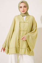 https://cdn.pazarium.com.tr/onu-bagcikli-oversize-tul-kimono-cagla-yesili-807494-19-B.jpg
