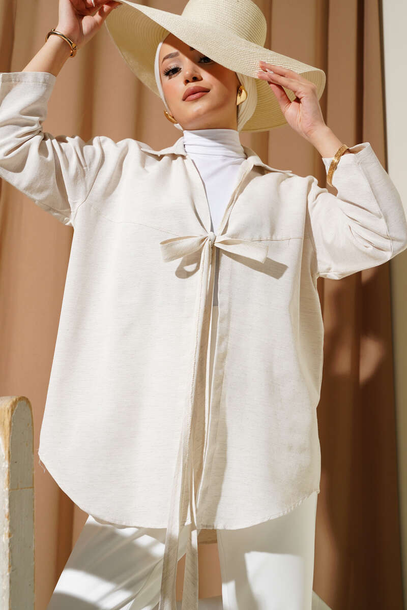 https://cdn.pazarium.com.tr/onu-baglamali-keten-kimono-bej-587255-14-B.jpg