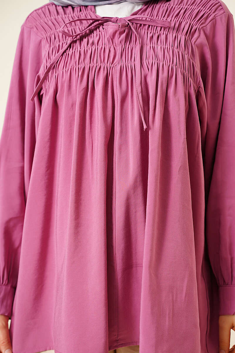 https://cdn.pazarium.com.tr/onu-gipeli-modal-tunik-magenta-803213-19-B.jpg