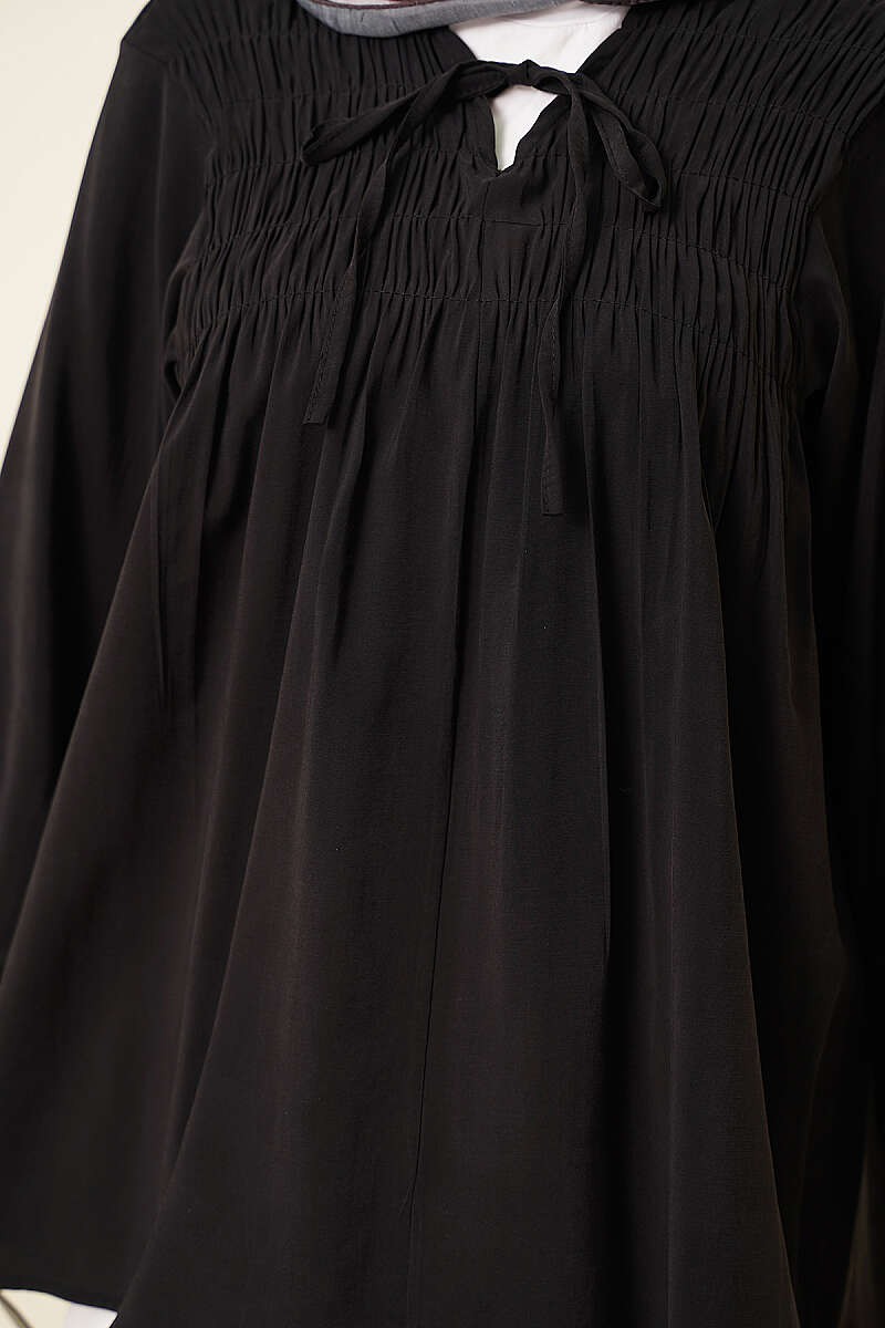 https://cdn.pazarium.com.tr/onu-gipeli-modal-tunik-siyah-803205-19-B.jpg
