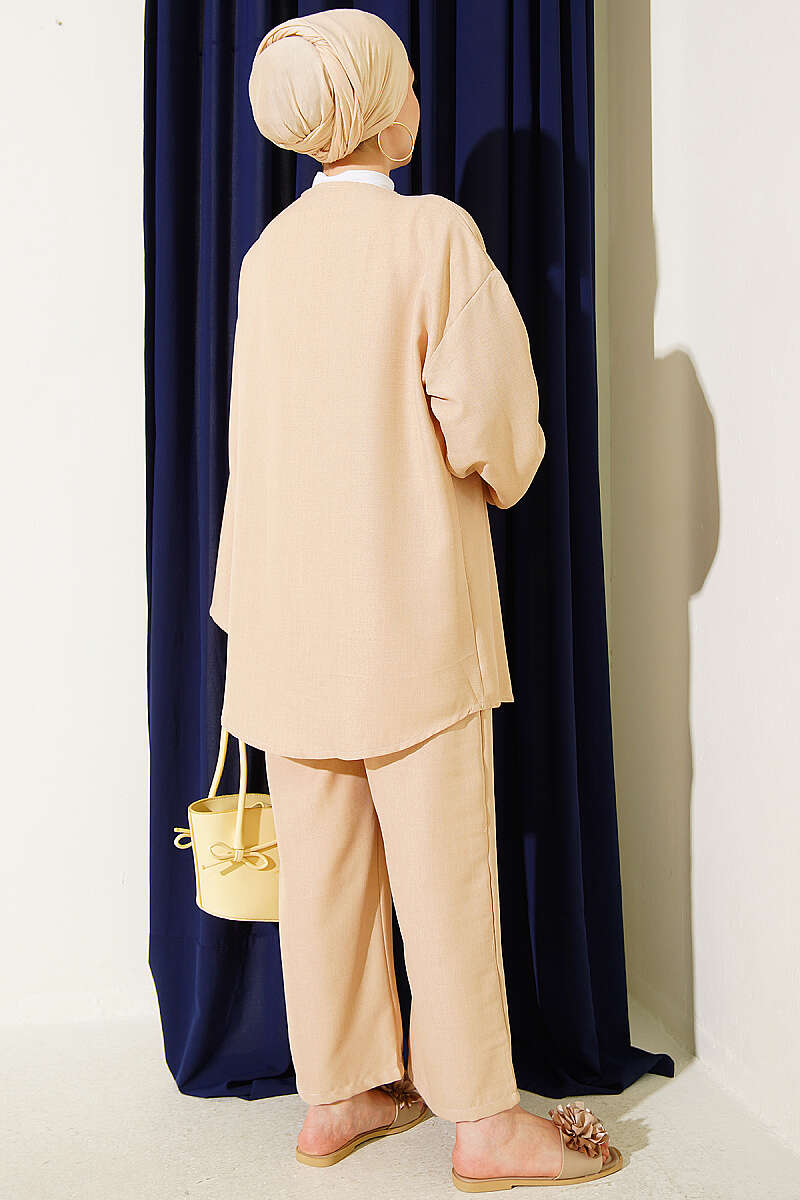 https://cdn.pazarium.com.tr/onu-ip-bagcikli-kimono-ikili-takim-bej-810648-20-B.jpg