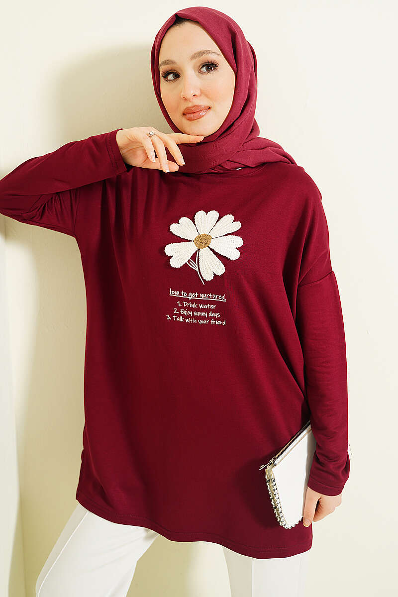 https://cdn.pazarium.com.tr/onu-papatya-armali-tunik-bordo-765818-18-B.jpg