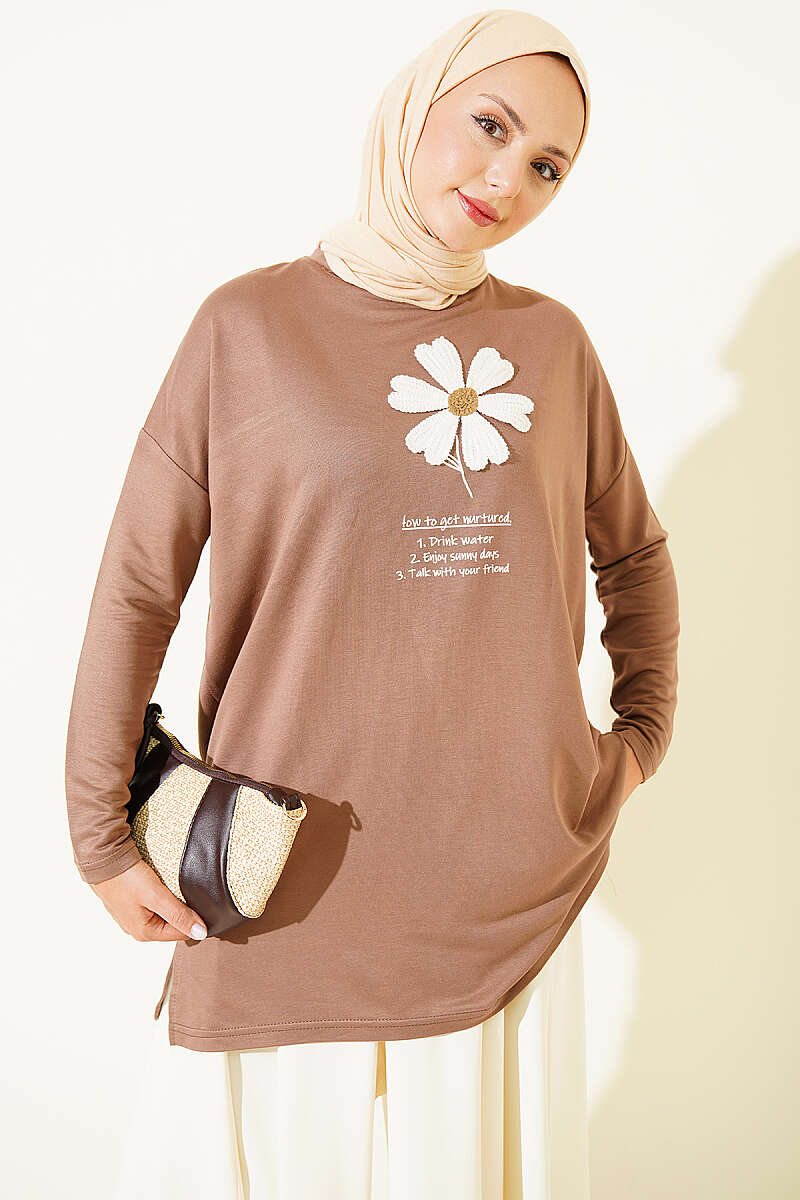 https://cdn.pazarium.com.tr/onu-papatya-armali-tunik-latte-811349-20-B.jpg