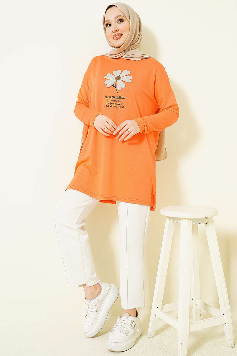 https://cdn.pazarium.com.tr/onu-papatya-armali-tunik-oranj-765840-18-B.jpg