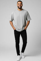 https://cdn.pazarium.com.tr/oversize-basic-erkek-tshirt-gri-705894-17-B.jpg