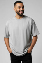 https://cdn.pazarium.com.tr/oversize-basic-erkek-tshirt-gri-705897-17-B.jpg